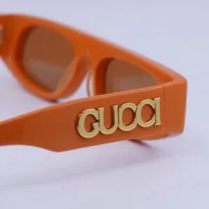 ?️ New Gucci GG1771S 007 Sunglasses - Shiny Orange Frame, Brown Lenses Gucci GG1771S 007 Sunglasses - US main image 3